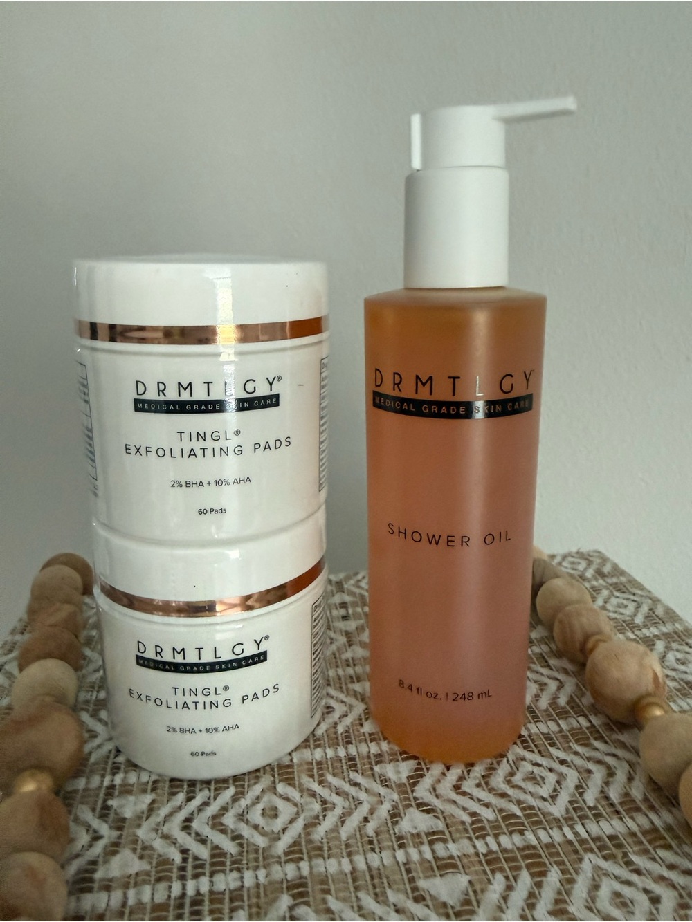 TINGL® Exfoliating Pads & Amber Shower Oil Set - White & Amber